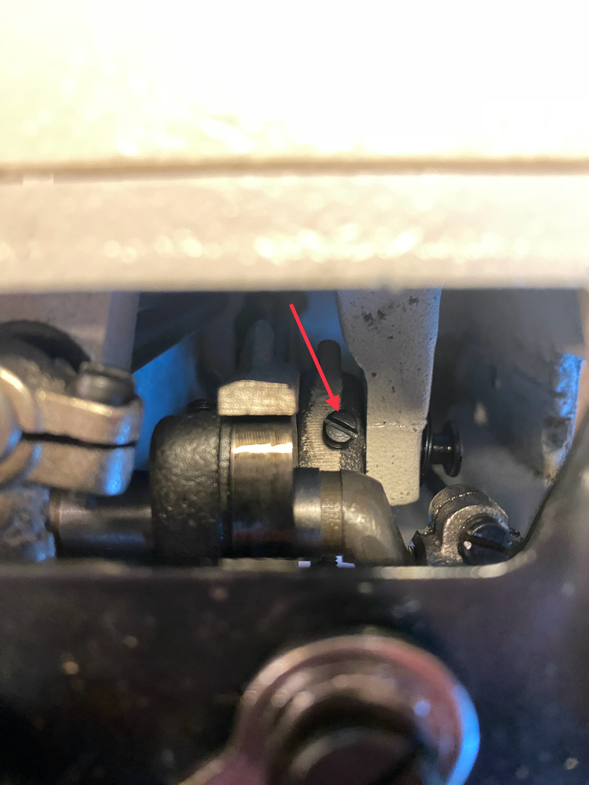 Loosen screw